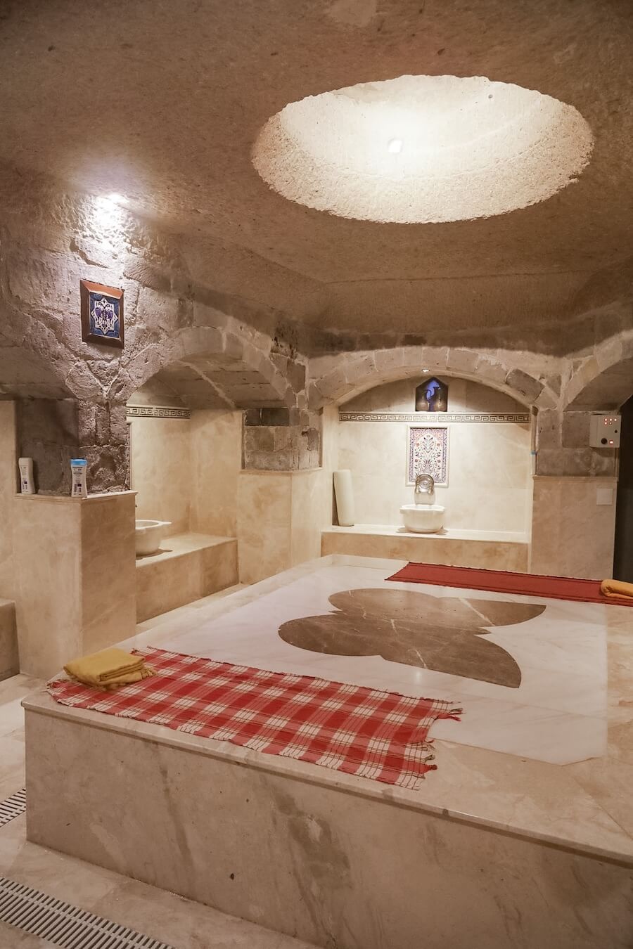 The butterfly Göbektaşi in the heated hammam room at the Kelebek Cave Hammam.